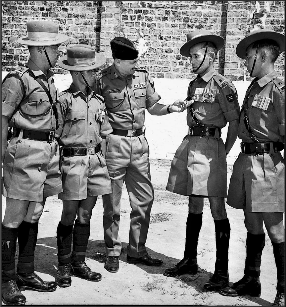 General Sam Manekshaw with decorated soldiers of the 8th Gorkha Rifles at Western front after 1971 Indo Pak war.