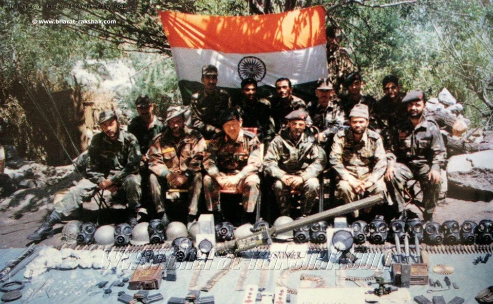 Officers Jawans of the 111 Gorkha Rifles Indian Army with captured weapons and other equipment of the Pakistan Army during 1999 Kargil war.