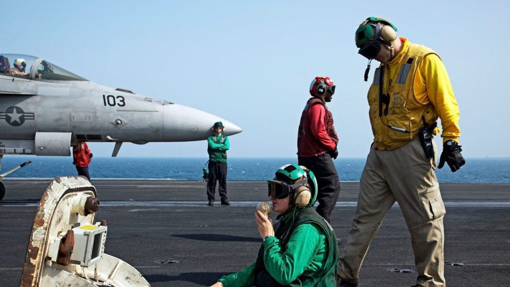 Decoding the Hand Signals of Aircraft Carrier Operations
