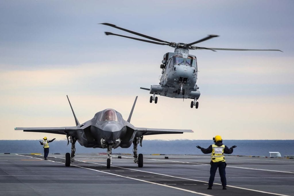 Decoding the Hand Signals of Aircraft Carrier Operations Landing Procedures on an Aircraft Carrier