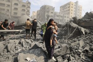 Israeli Strikes Kill 94 in Gaza as Humanitarian Aid Plans Begin