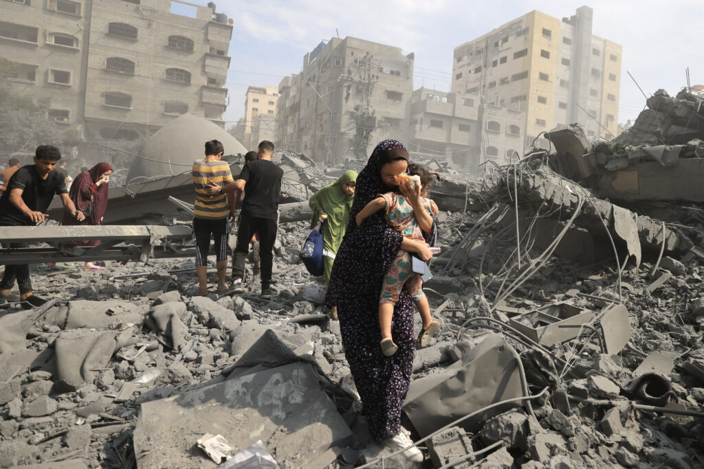 Israeli Strikes Kill 94 in Gaza as Humanitarian Aid Plans Begin