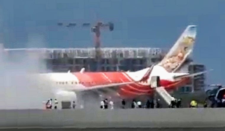 Air India Flight Encounters APU Fire After Landing at Delhi Airport