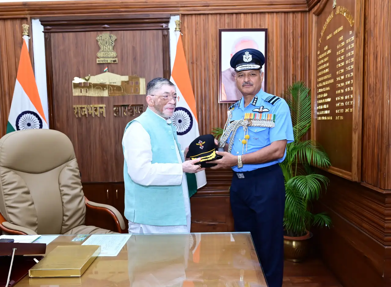 Air Marshal Surat Singh and Shri Santosh Gangwar