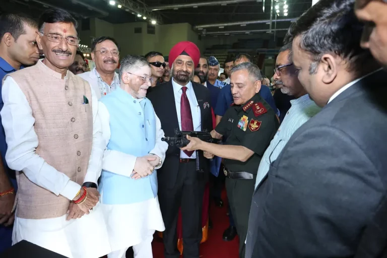 Gen Anil Chauhan Showcasing a Gun