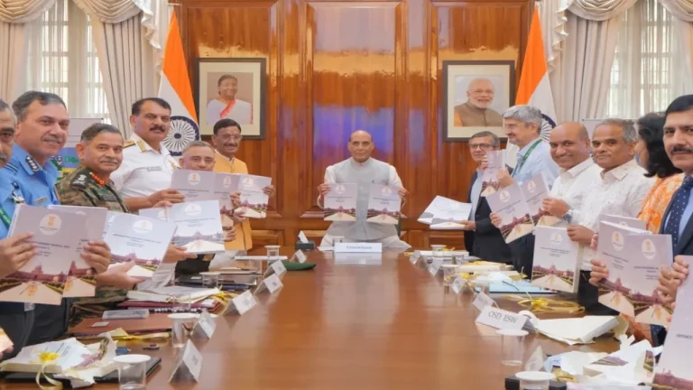 Defence Minister with Officers and Others