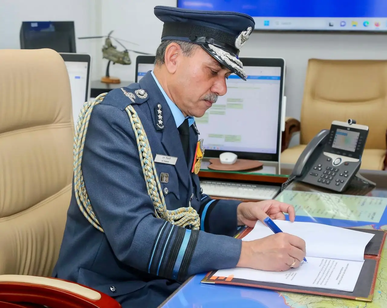 Air Marshal Narmdeshwar Tiwari Signing