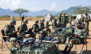 Soldiers Using Mobile and Laptops