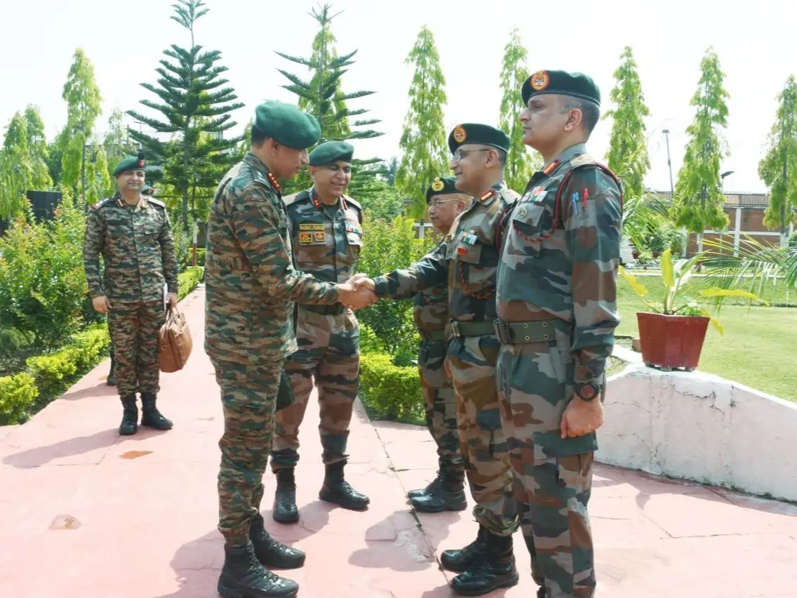 Lt Gen Kalia Shaking Hands