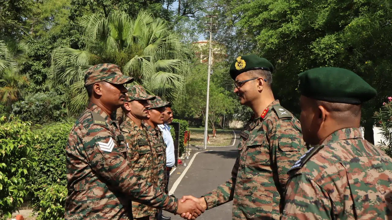 Maj Gen Manish Kumar Shaking Hands