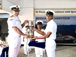 Officer Giving Trophy