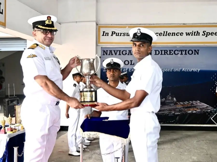 Officer Giving Trophy