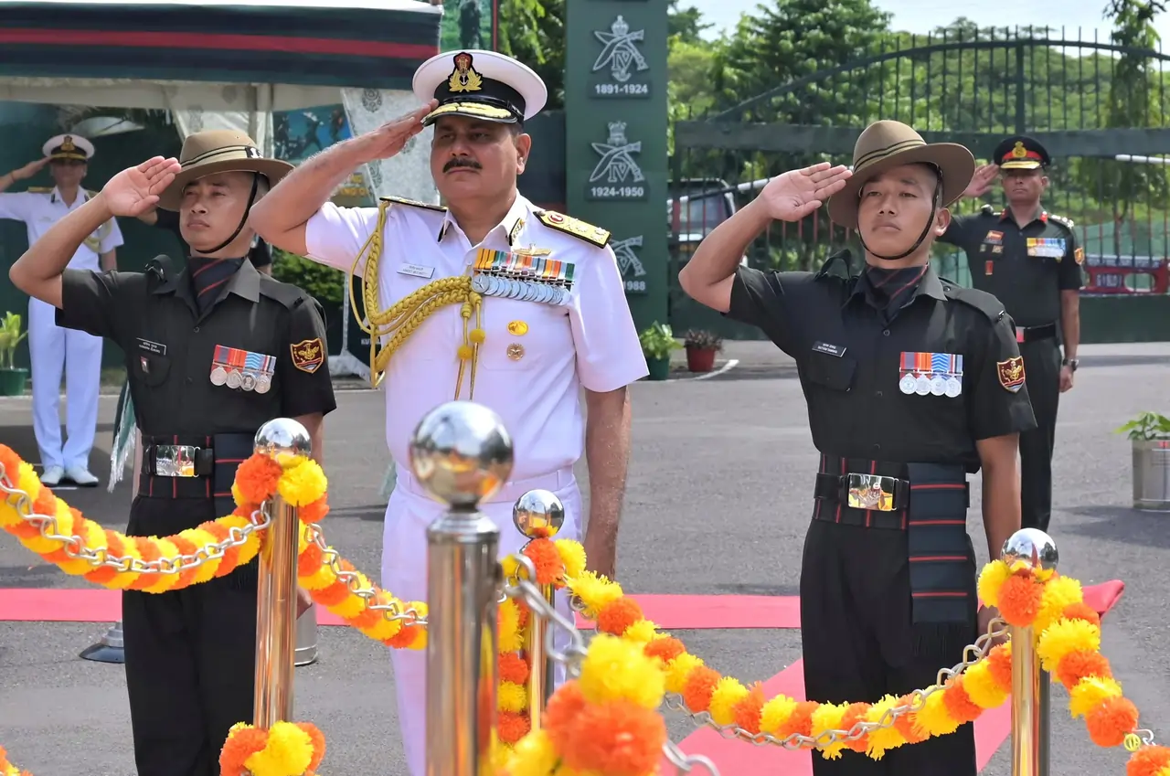 Vice Admiral Vineet McCarty Saluting