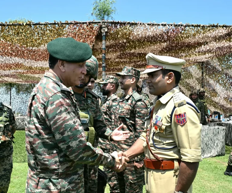 General Dhiraj Seth Shaking Hands
