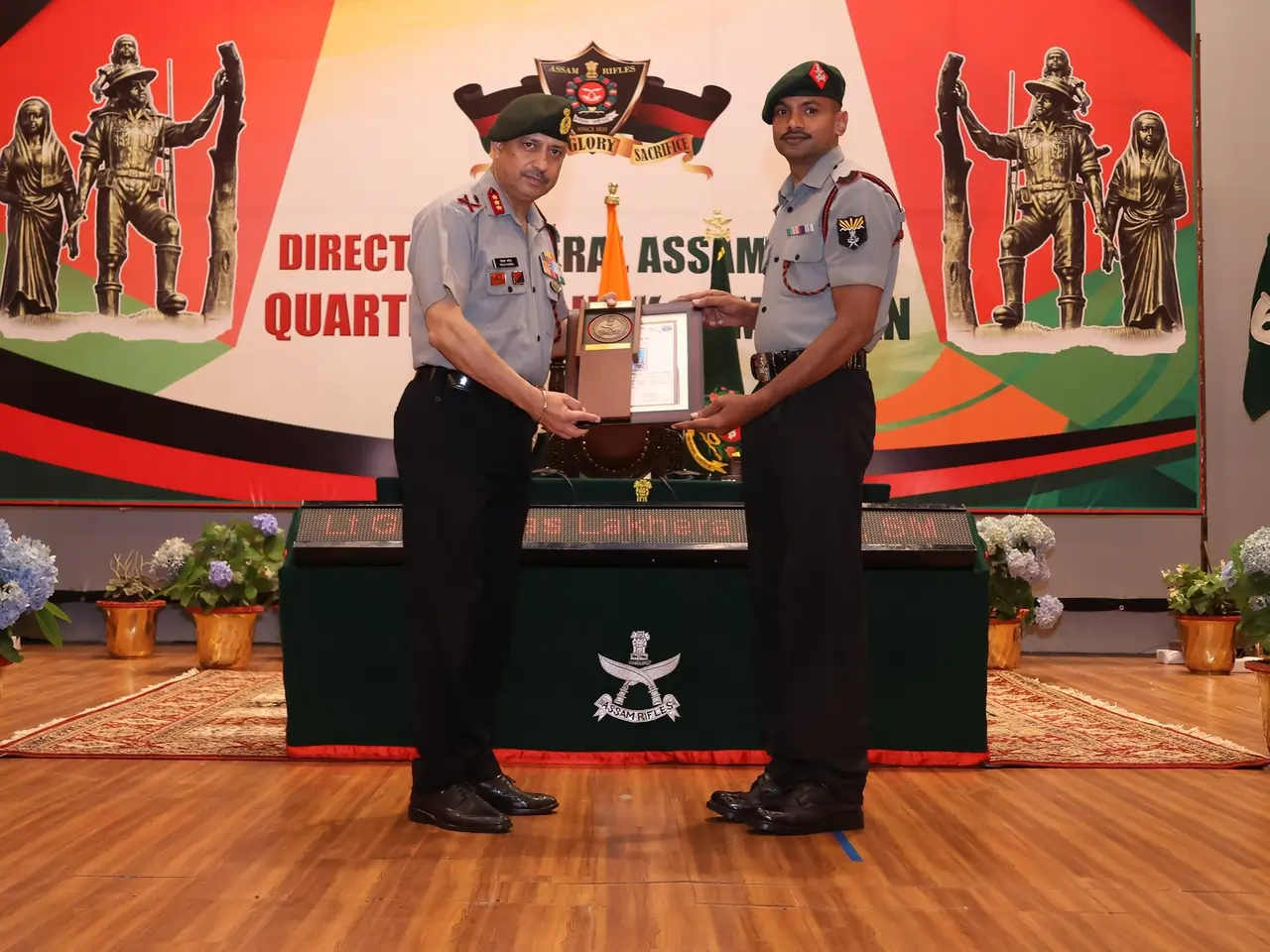 DG Assam Rifles Giving Award to Officer
